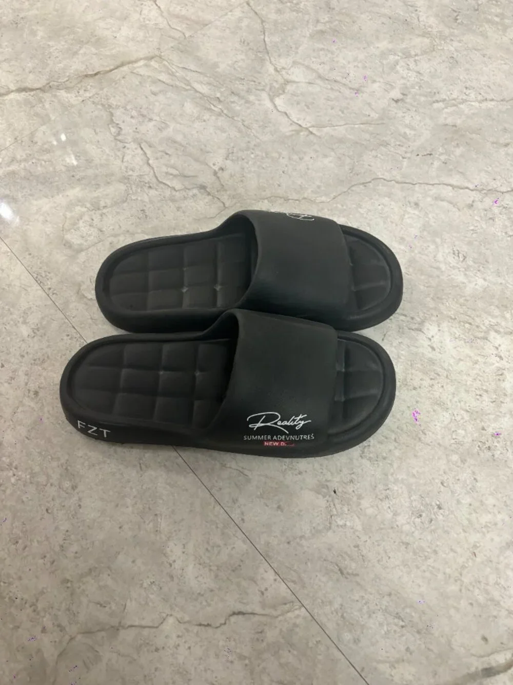 N/A black slippers